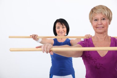 Women in an aerobics class clipart