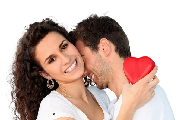 Couple with heart-shaped object — Stock Photo, Image