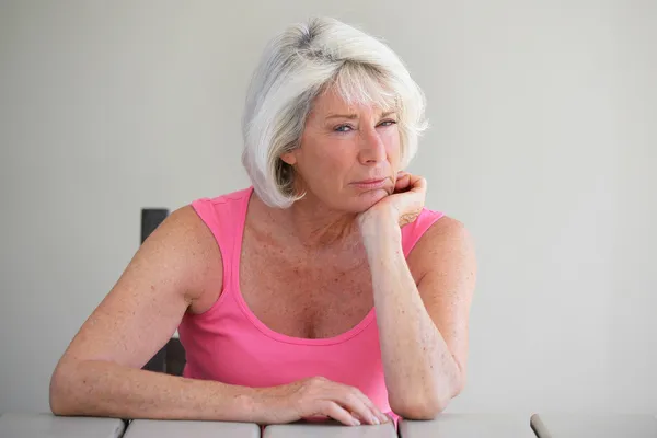 Senior lady thinking — Stock Photo, Image