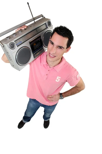 Young man with a ghettoblaster — Stock Photo, Image