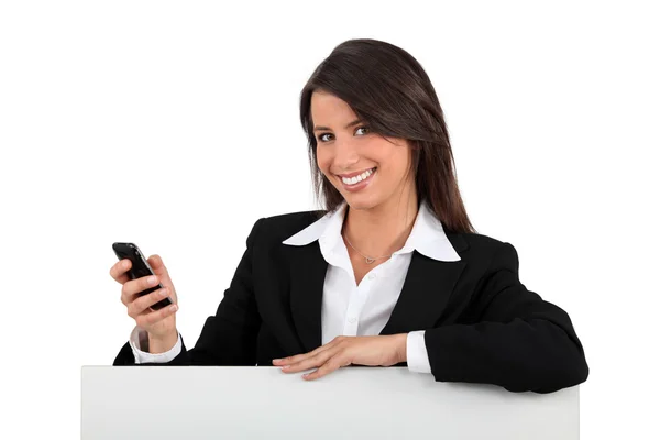 Young presenting a mobile phone — Stock Photo, Image
