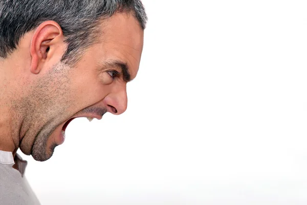 Um homem zangado gritando — Fotografia de Stock