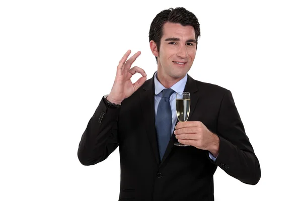 Businessman with champagne — Stock Photo, Image