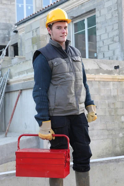 Trabalhador da construção civil que chega ao trabalho — Fotografia de Stock