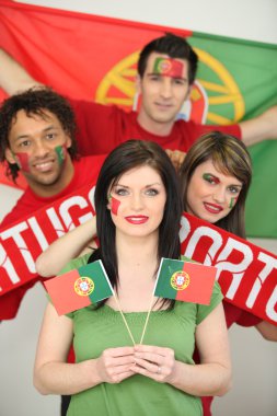 Group of friends supporting the Portuguese football team clipart