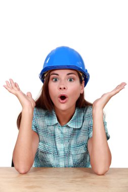 Surprised female construction worker clipart