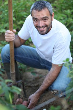 Man in his garden clipart