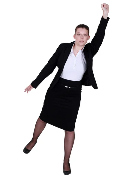 Бізнес-леді досягає в повітрі — стокове фото