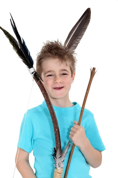 Little boy holding bow and arrow — Stockfoto