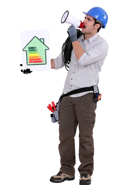 Man with a speaker and energry info — Stock Photo, Image