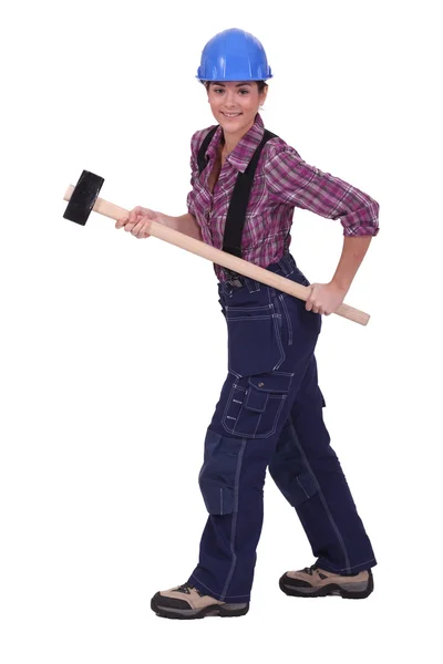 Woman with a sledgehammer — Stock Photo, Image