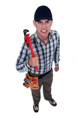 A mad handyman. clipart