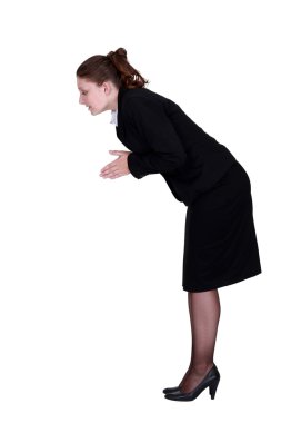 A businesswoman about to dive. clipart