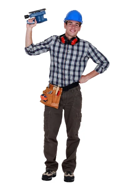 Worker with an electric sander — Stock Photo, Image