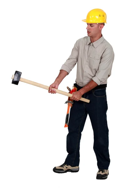 Tradesman holding a mallet — Stock Photo, Image