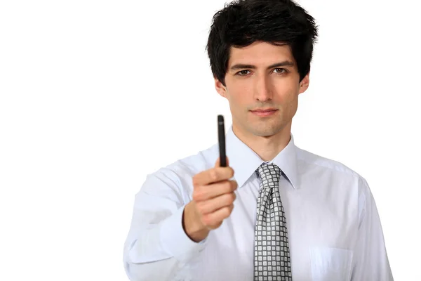 Empresário confiantemente segurando caneta — Fotografia de Stock