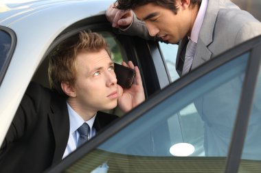 Businessmen talking before a meeting clipart