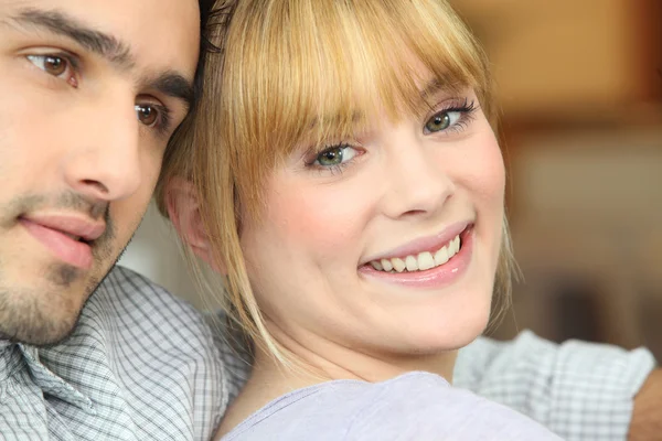 Closeup of a happy young couple at home — Stock Photo, Image