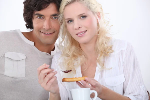 Couple having breakfast — Stock Photo, Image