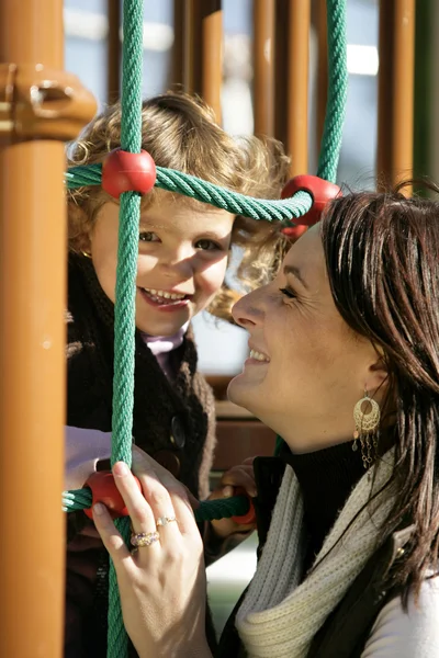 Mother and daughter at the playground — Stock Photo, Image