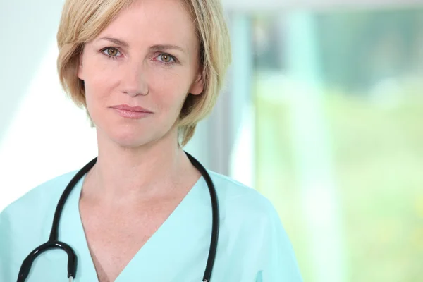 Closeup of a calm and collected female medic Royalty Free Stock Images