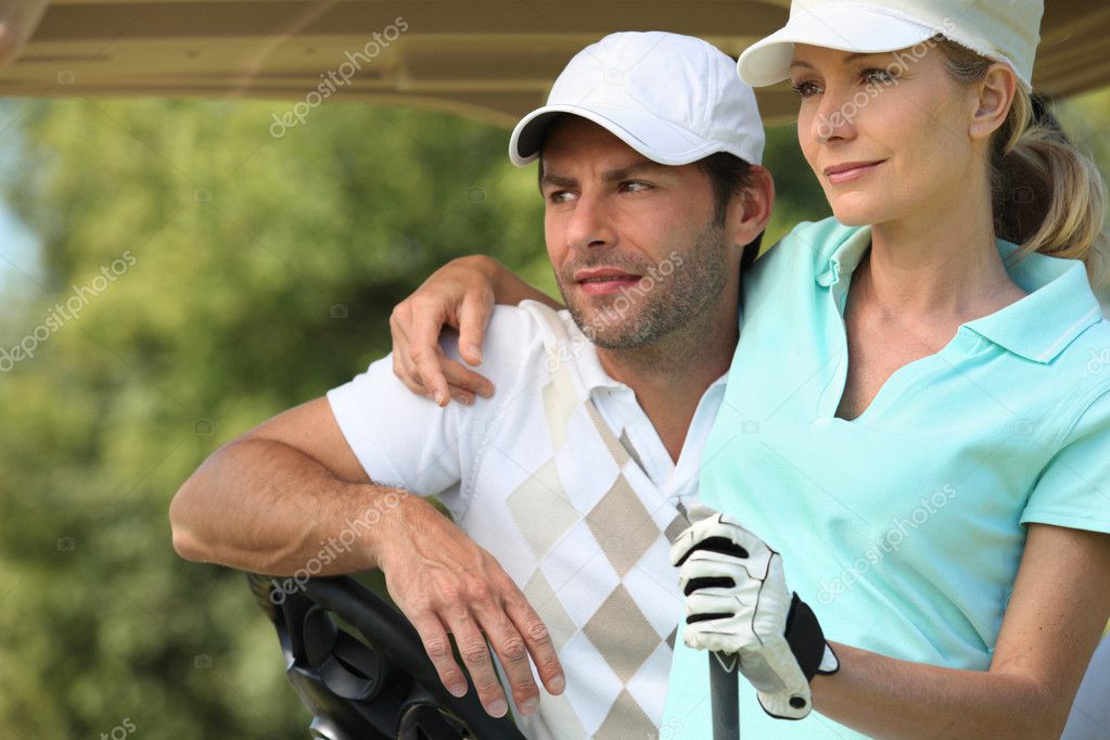 Couple playing golf — Stock Photo © photography33 #8554815