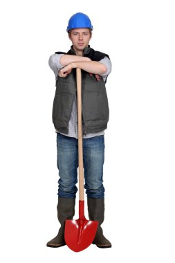 Man stood with shovel clipart