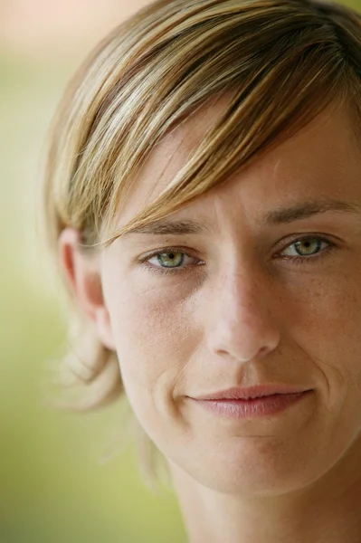 Portrait of a woman with short blonde hair — Stock Photo, Image