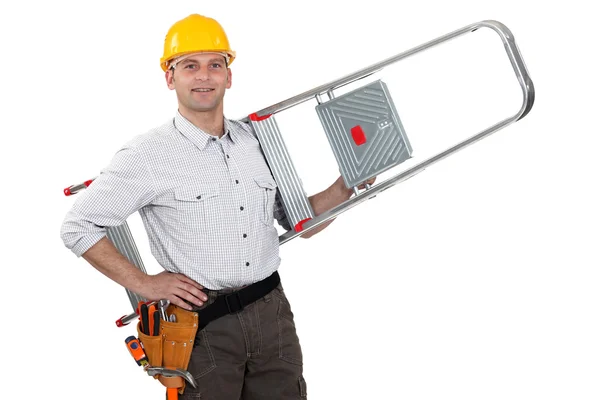 Worker carrying ladder — Stock Photo, Image