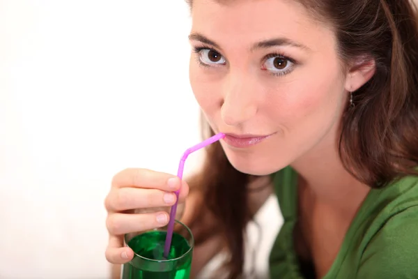 Woman drinking mint squash — Stock Photo, Image