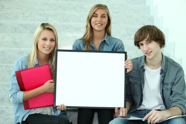 Portrait of three teenagers in stairs — Stock Photo, Image