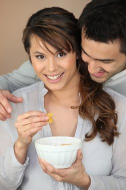 Couple having breakfast together clipart