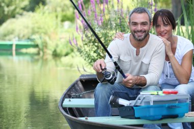 Sitting boat fishing clipart