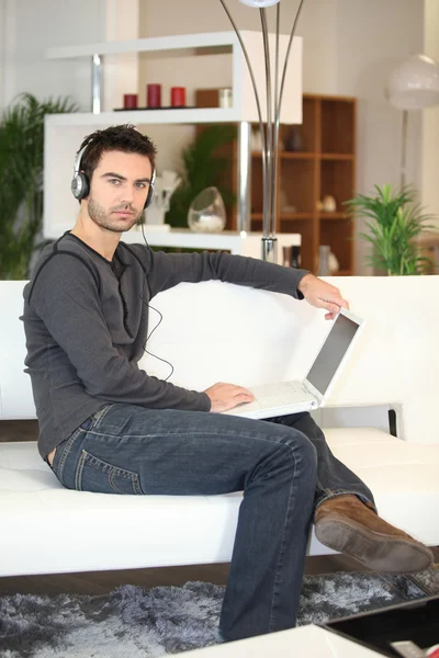 Man at home with music — Stock Photo, Image