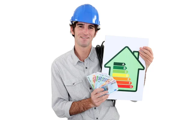 Electrician with cash and a ratings symbol — Stock Photo, Image