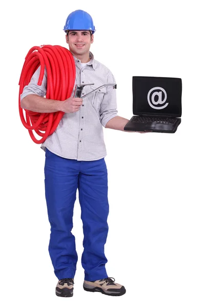 A plumber promoting internet. — Stock Photo, Image