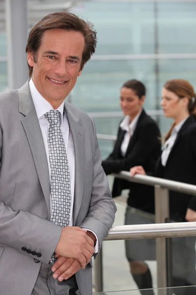 Businessman standing outside — Stock Photo, Image