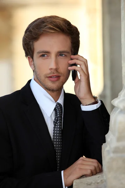Young businessman on phone — Stock Photo, Image