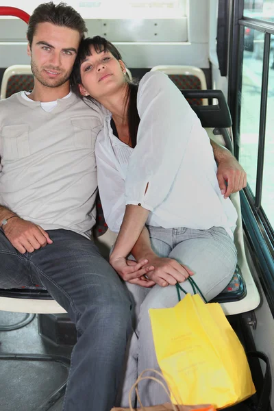Couple embraced inside a bus Royalty Free Stock Photos