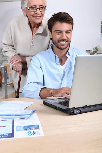 Happy doing accounting at home — Stock Photo, Image