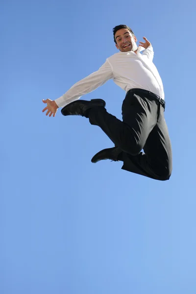 Affärsman hoppar i luften — Stockfoto