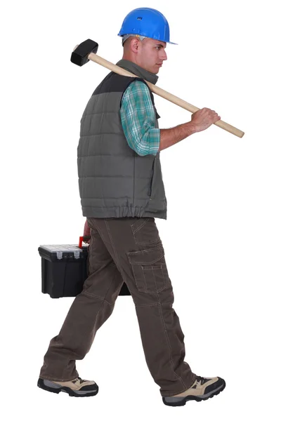 Construction worker carrying tools — Stock Photo, Image