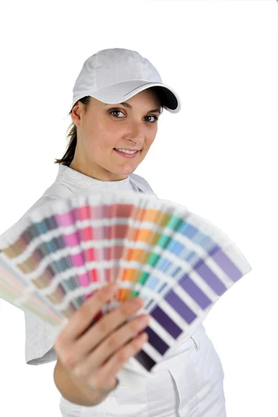 Decorador com uma amostra de cor — Fotografia de Stock