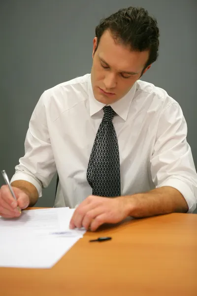 Businessman writing Stock Picture