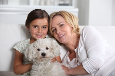 Mother, daughter and the dog clipart