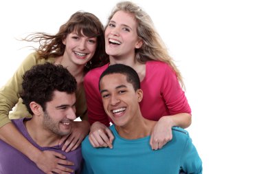 Two teenage couples in studio clipart