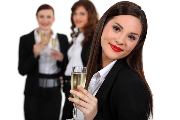 Business women drinking champagne — Stock Photo, Image