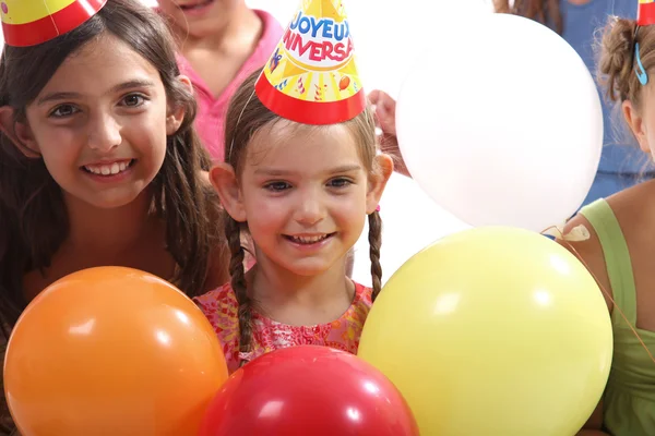 Happy little girls at birthday party — Stock Photo, Image