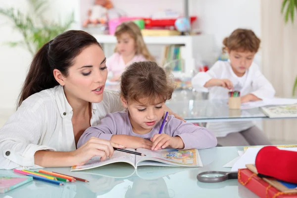 Leraar met een leerling — Stockfoto