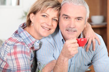 Senior couple embracing clipart